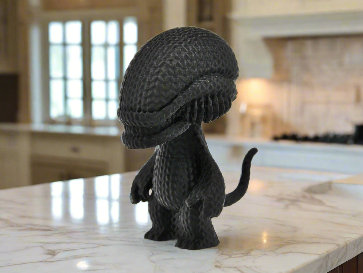 Black Alien Creature Figurine: Sci-Fi Inspired Decor