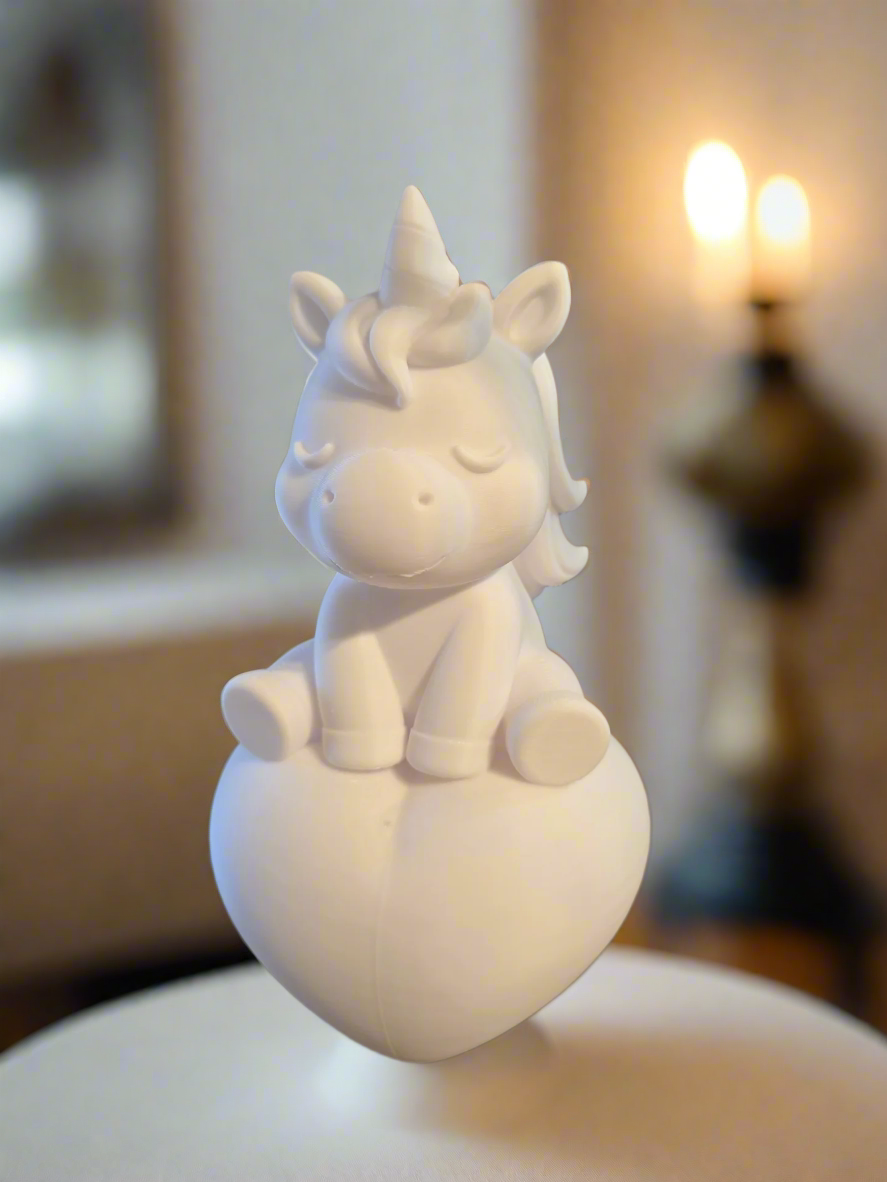 Unicorn Sitting on a Heart Love & Fantasy