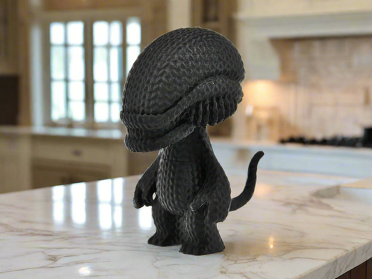 Black Alien Creature Figurine: Sci-Fi Inspired Decor