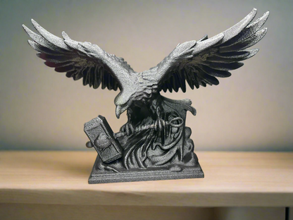 A statue of an eagle with its wings spread open, perched on a base that has a hammer.