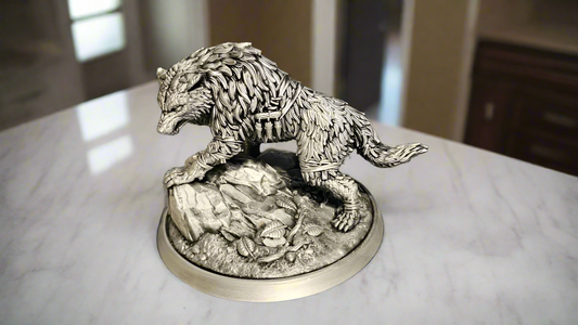 Realistic Wolf Sculpture on Rocks: Nature Inspired Decor