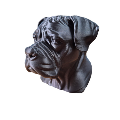 Black dog sculpture on a white background