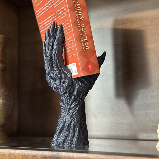 Dragon claw book holder bookend with red book fantasy collectible