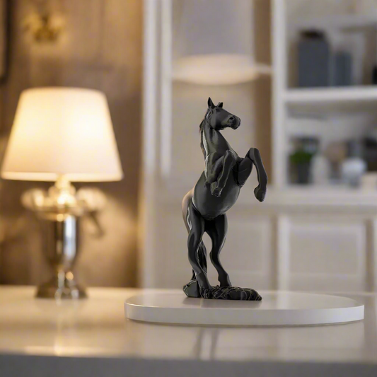 Black modern horse figurine in PLA resin on white pedestal in office decor