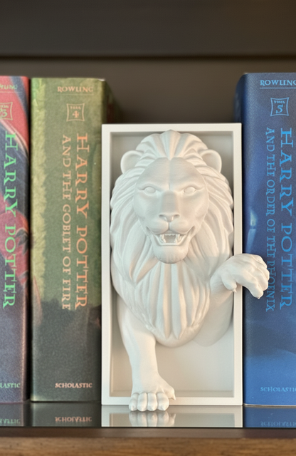 White lion head sculpture between literary books shelf decoration figurine