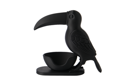 Toucan bird serving bowl product shot - artistic home decorative item against white background